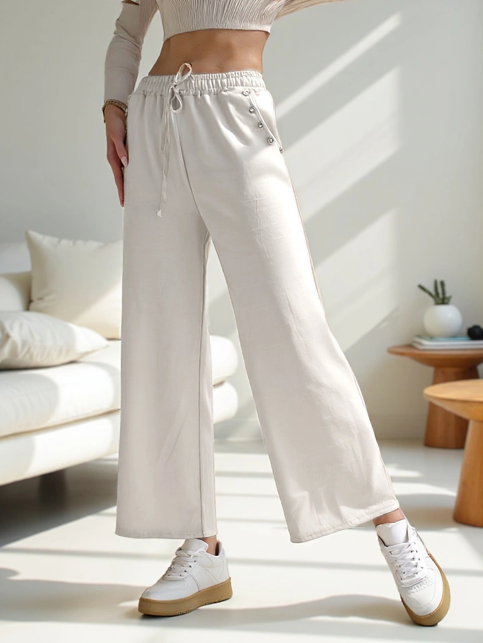 Royalfashion Dámské široké teplákové kalhoty se kamínky